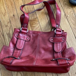 Red leather Tignanello double straps lots of pockets clean no damage found.